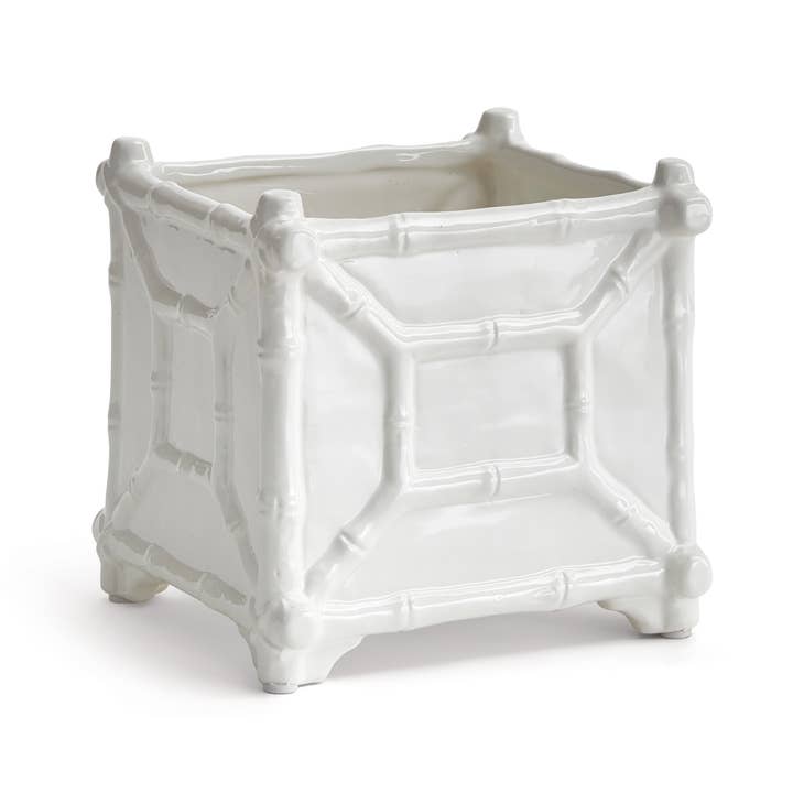 Large white chinoiserie-inspired cachepot with classic bamboo detailing