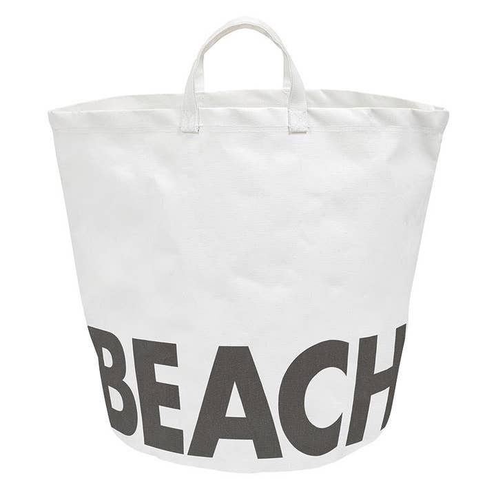 Large white cotton canvas tote with oversized black "BEACH" lettering