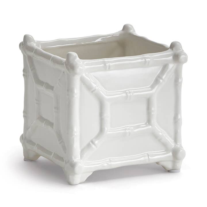 Small white chinoiserie-inspired cachepot with classic bamboo detailing